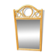 Curved wooden mirror and rattan