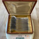 Art Deco oyster forks in punched silver metal, leatherette box