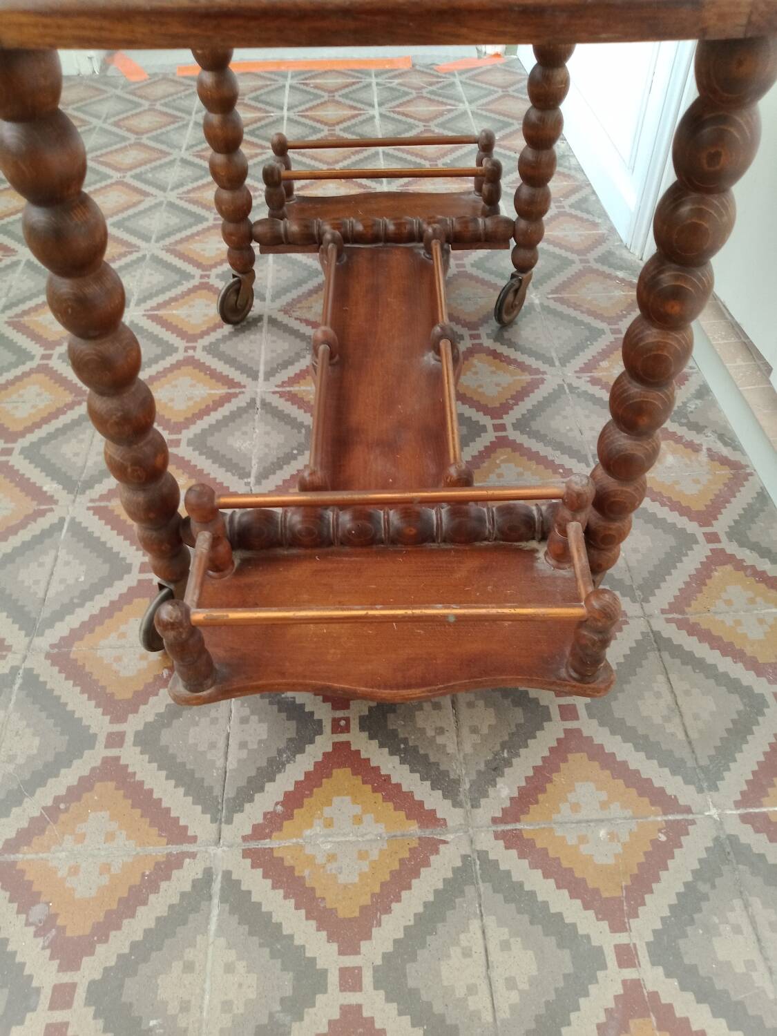 Wooden trolley on wheels