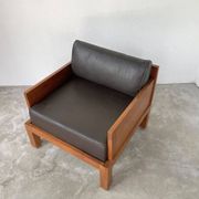 Fauteuil moderniste bois exotique et cuir