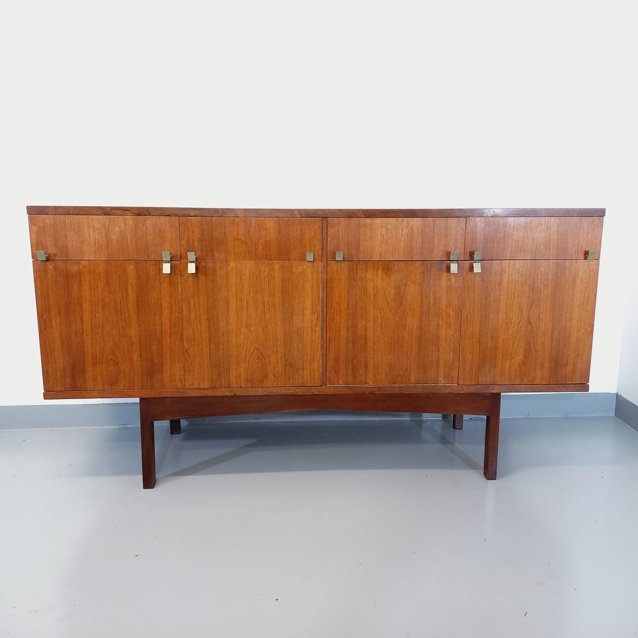 Vintage Scandinavian style row in rosewood and brass from the 60s