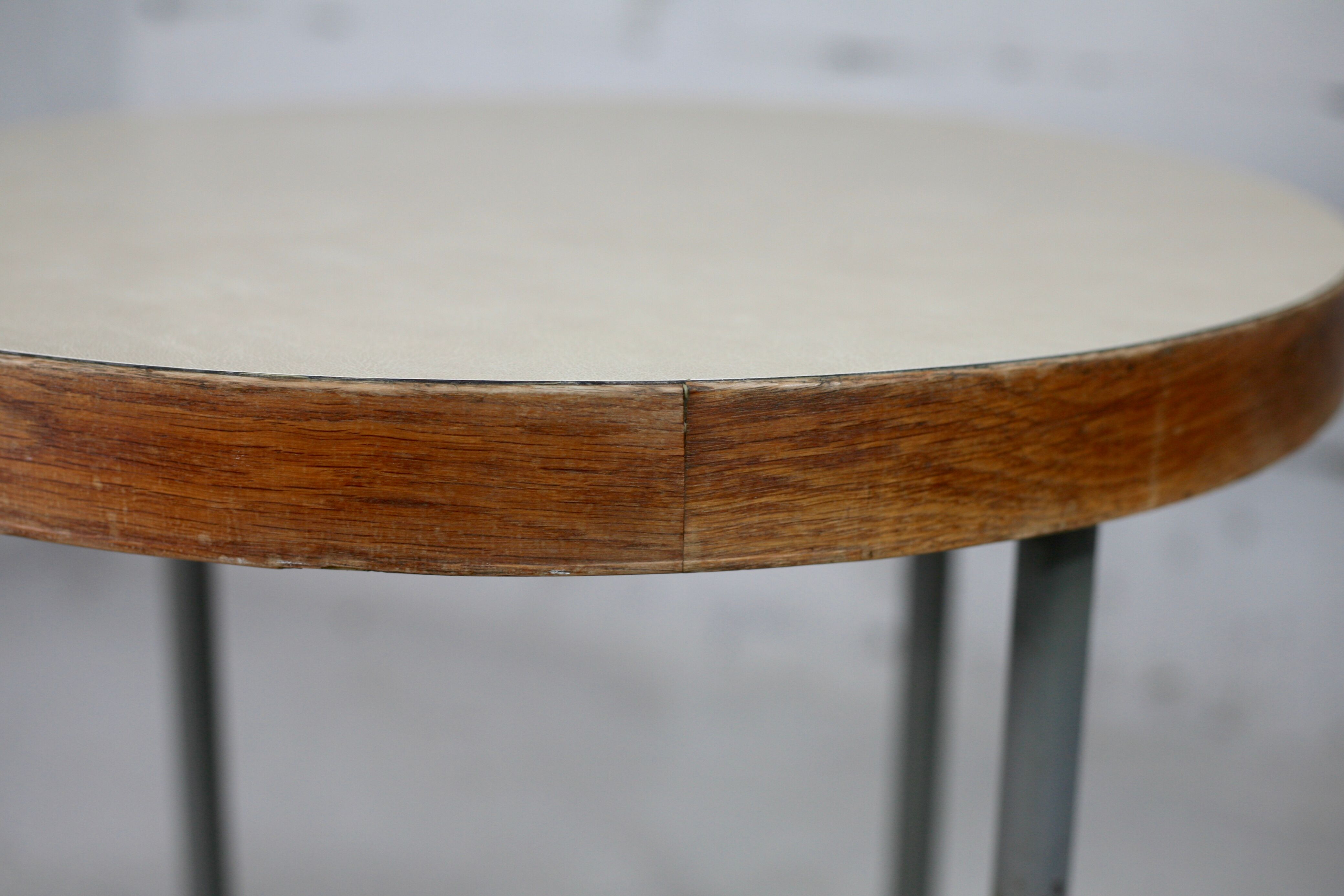 Side table tubular steel base, round top strapping wood, France, circa 1950