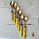 Brass and bakelite dessert cutlery