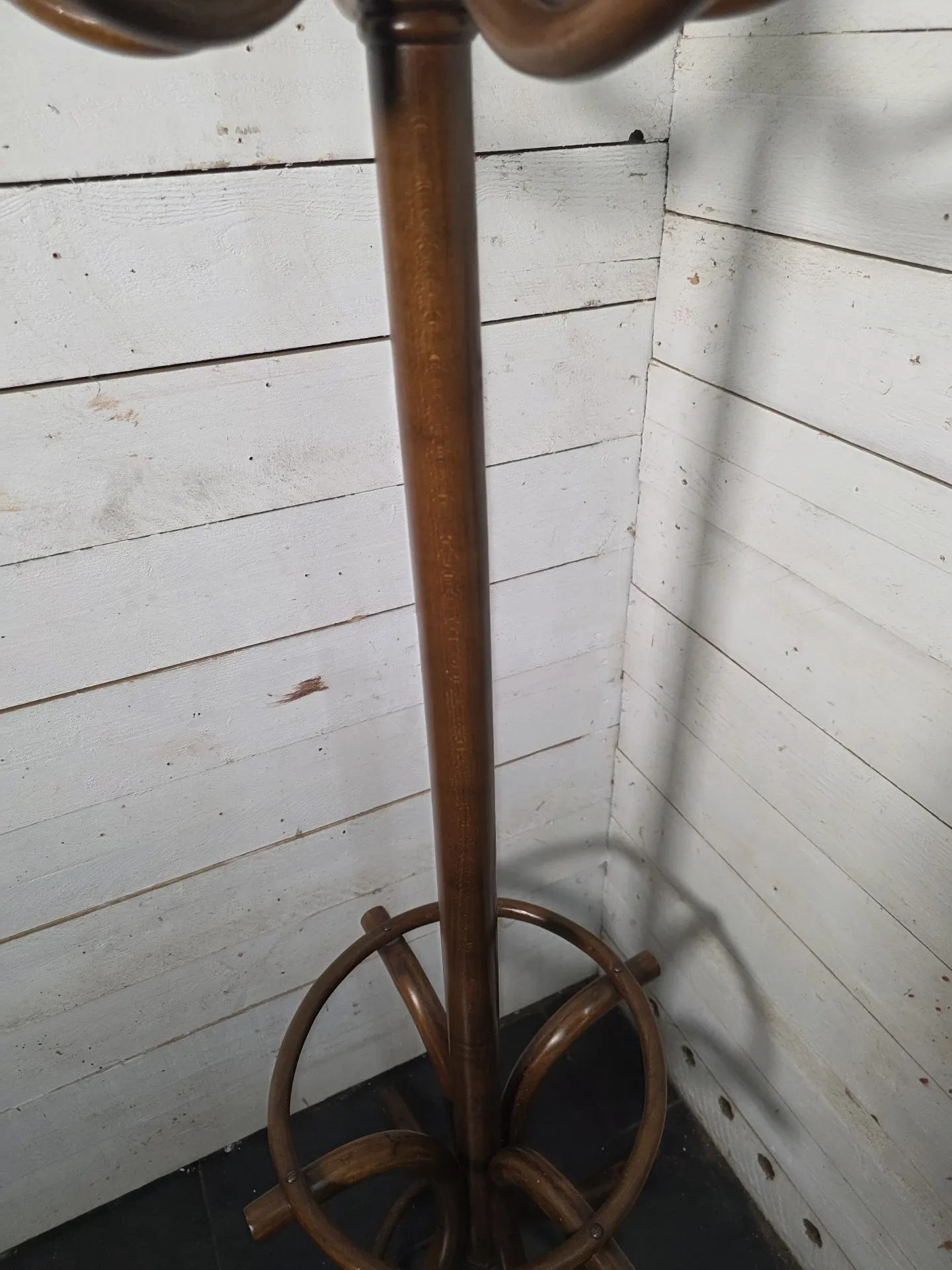 Curved antique wooden parrot