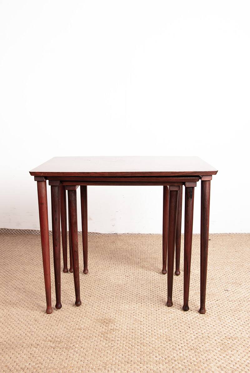 Three Danish nesting tables in rosewood by Mobelintersia 1960.