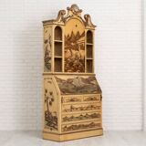Desk with oriental motifs in relief