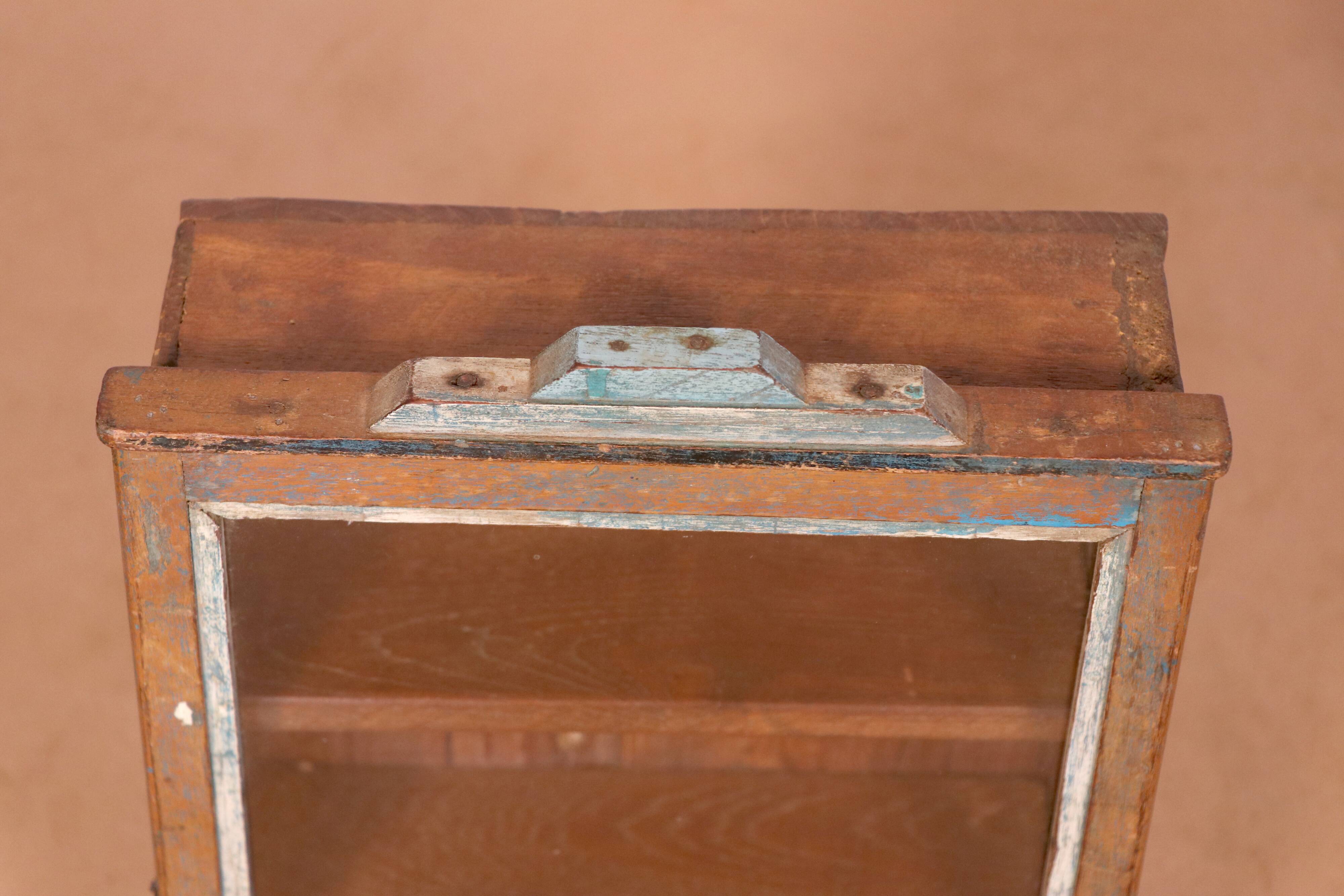 Old art deco wall display case in burmese teak