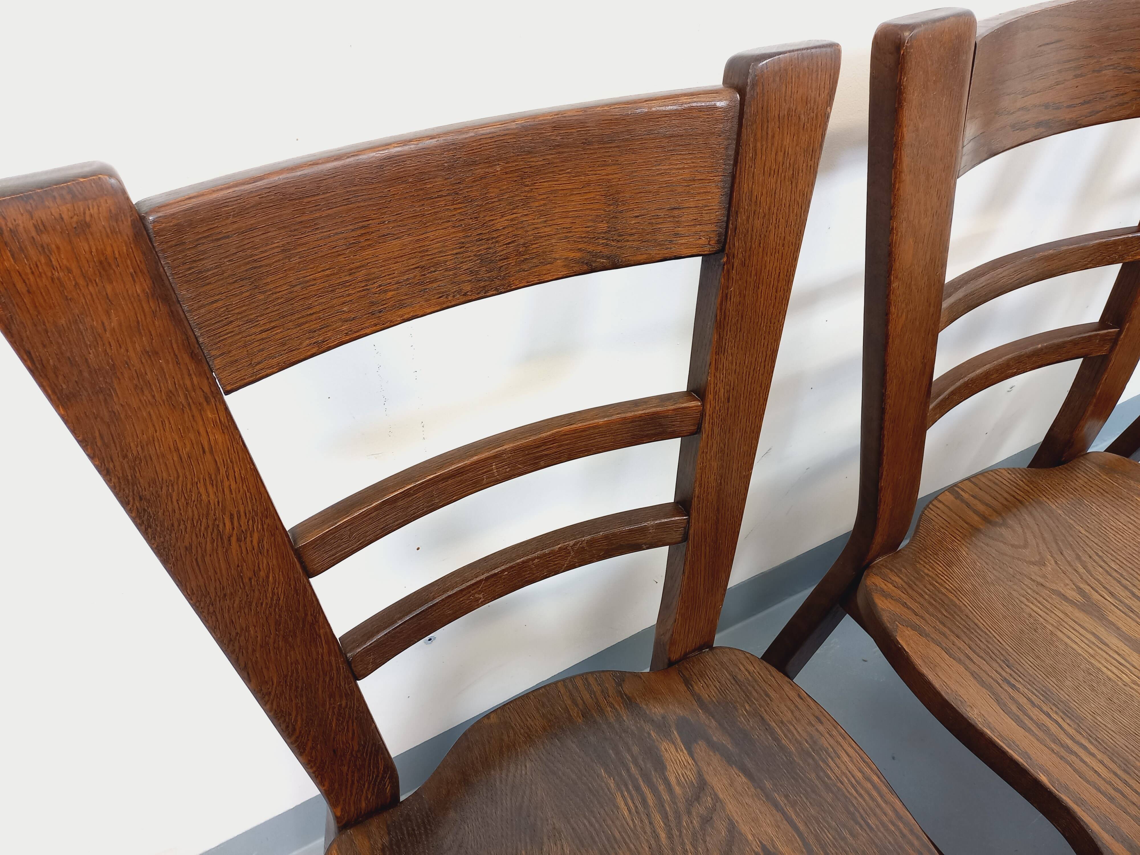 Set of 6 vintage brutalist oak chairs from the 1950s.