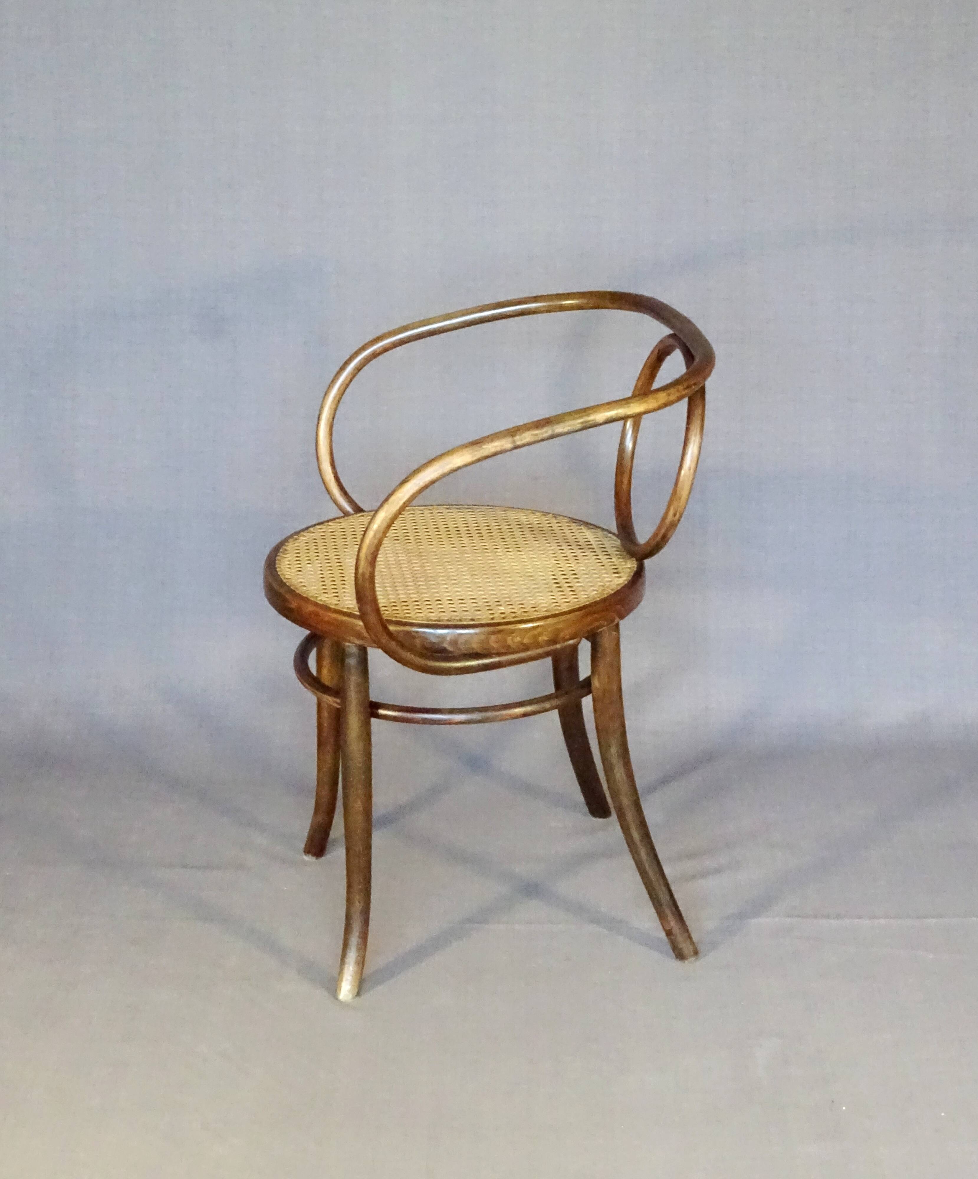 Le Corbusier armchair by Fischel 1890 caned, not Thonet.