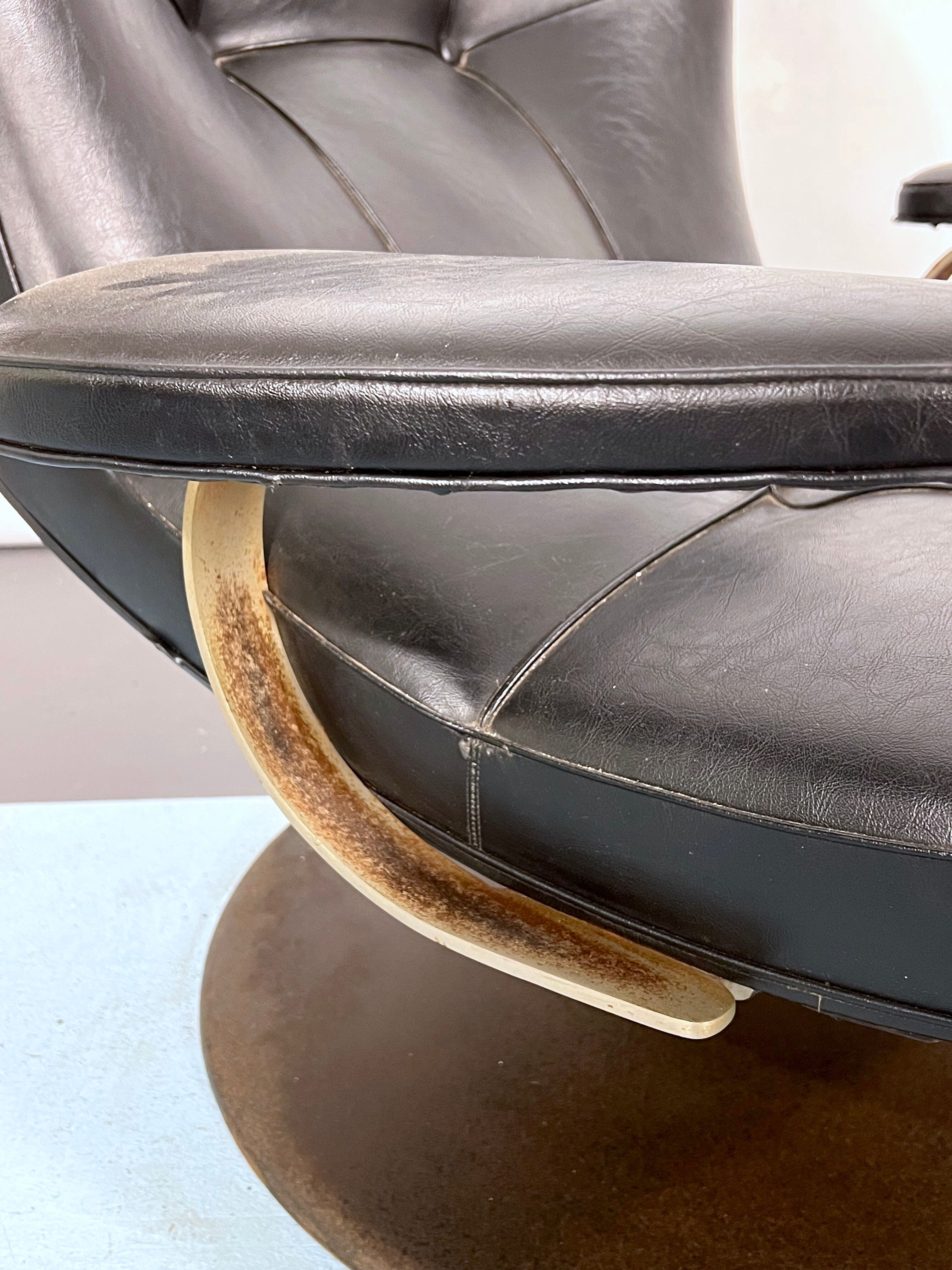 Vintage Italian black swivel armchair from 60s