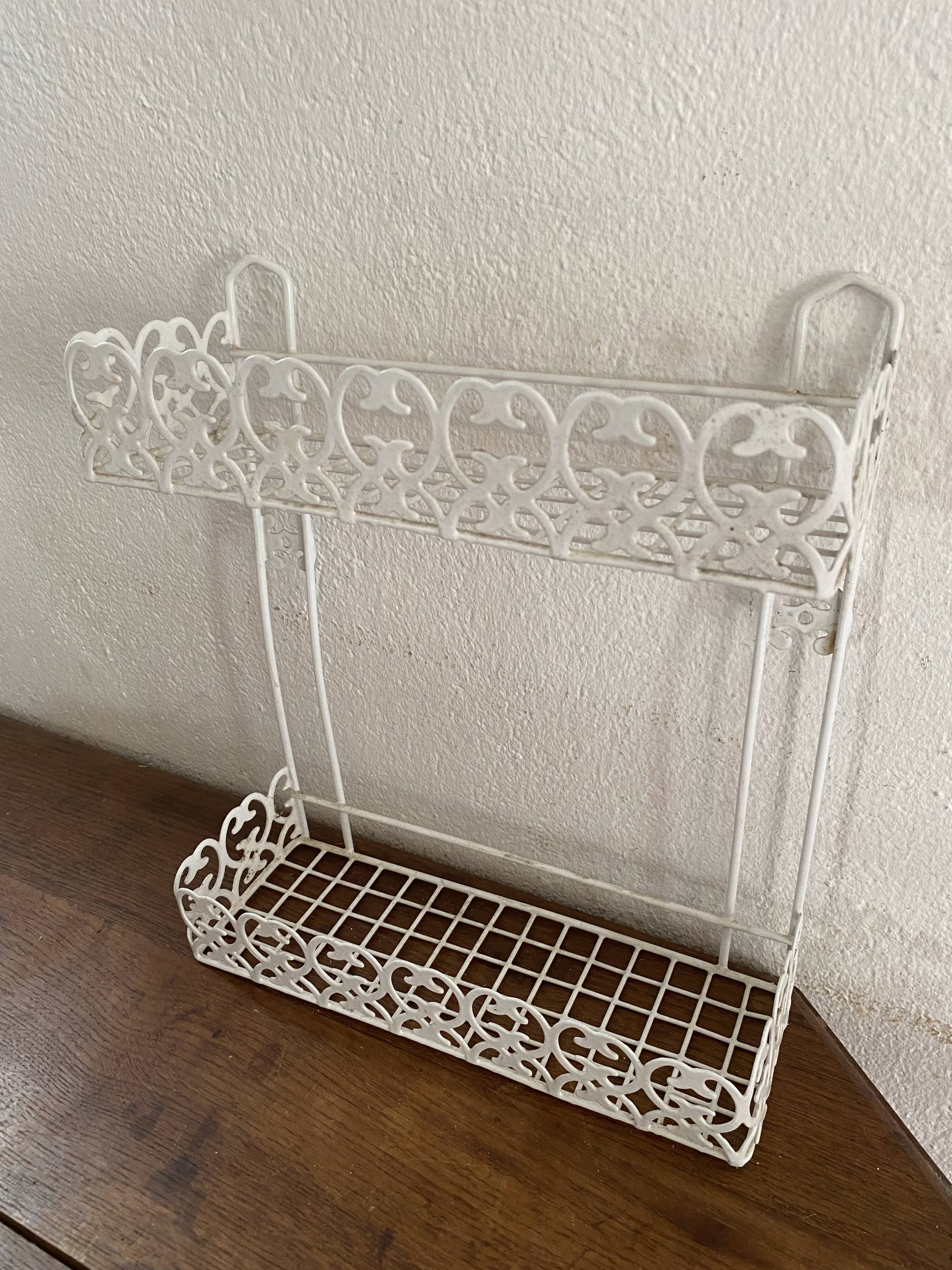 Openwork metal shelf