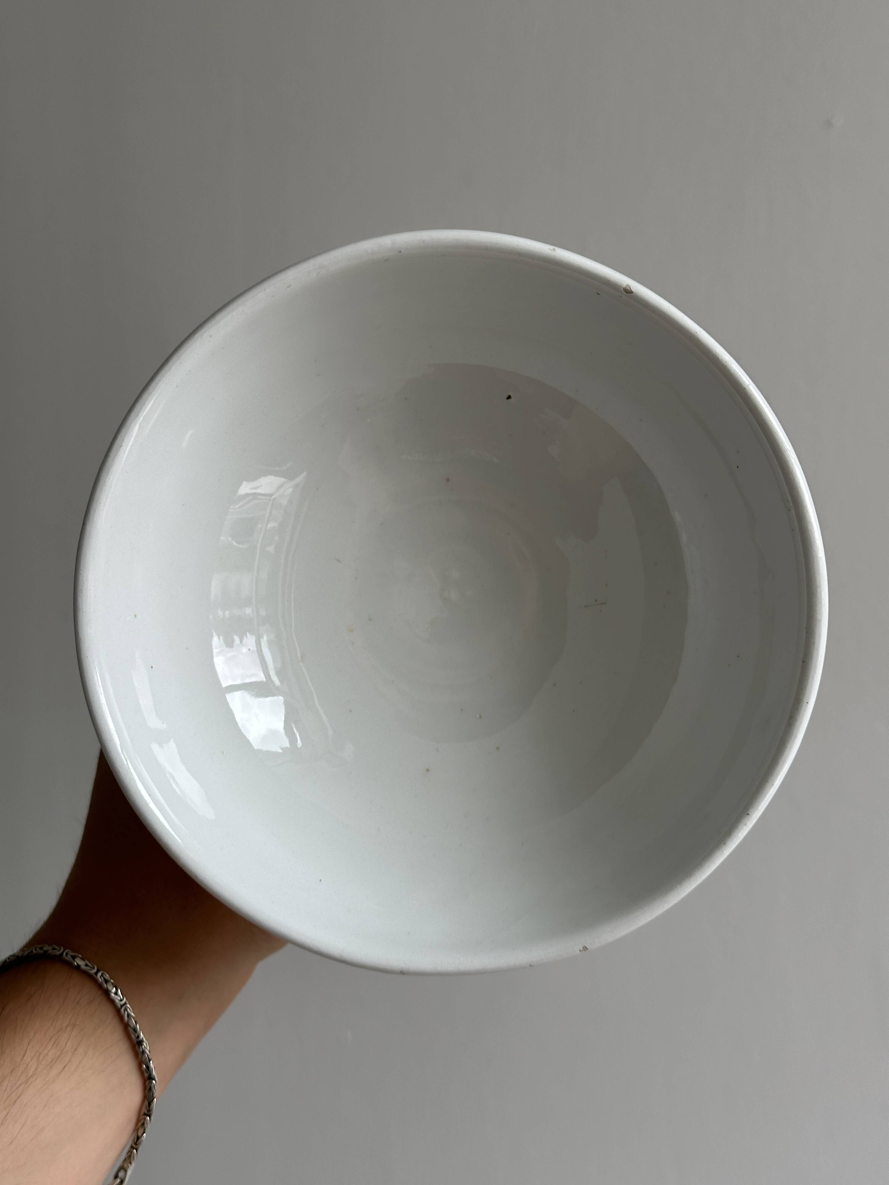 Decorated white porcelain cup