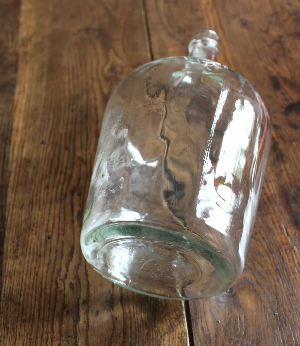 Give me a transparent glass bottle, Jeanne.