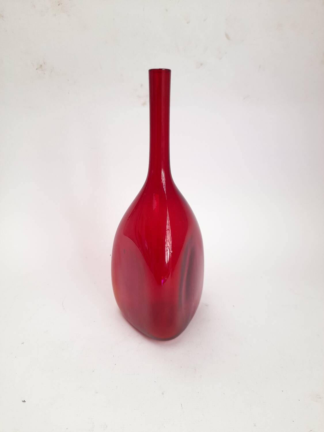 Triangular red glass vase by Gunnar Ander for Elme Glasbrück.