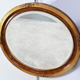 Miroir ovale en bois doré – début XXe