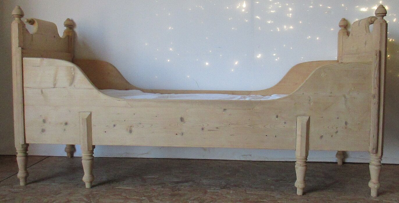 Retractable sofa bed of the Austrian Tyrole in natural wood