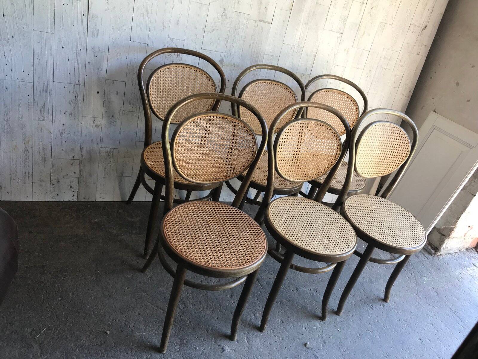 Set of 6 brown bistro chairs in beech with natural cane seat, Germany 1960s.