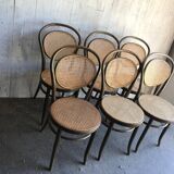 Set of 6 brown bistro chairs in beech with natural cane seat, Germany 1960s.