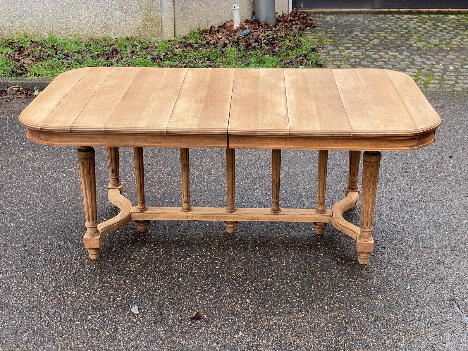Renovated dining table in solid oak from the 19th century in Napoleon III style.