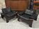 Paire de fauteuils scandinaves en cuir et palissandre