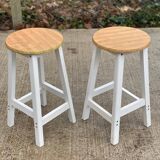 Pair of white and wood effect round stools