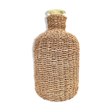 Glass bottle and braided rope