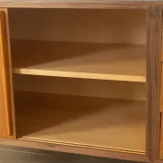 Striking mid-century sideboard with stainless steel base