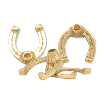 vintage x4 set of brass horseshoes as napkin rings
