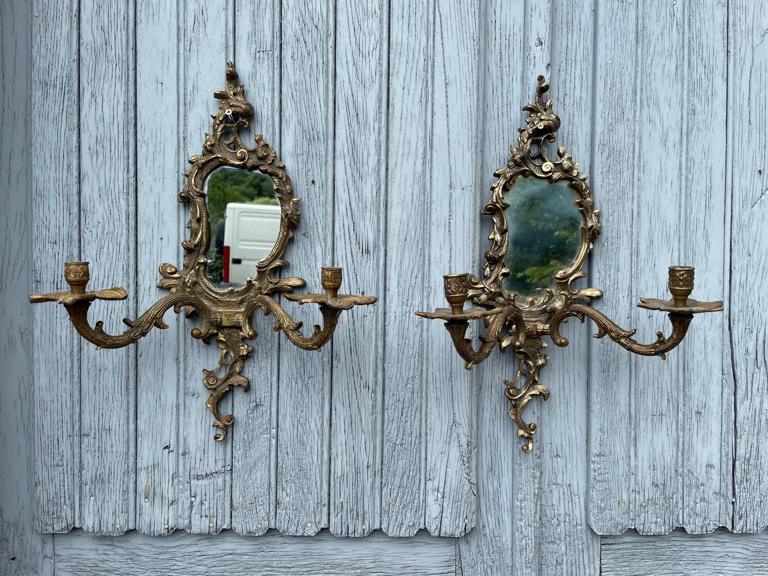 Pair of vintage bronze wall sconces with mirror and 2 candles