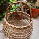 Openwork basket in willow rush