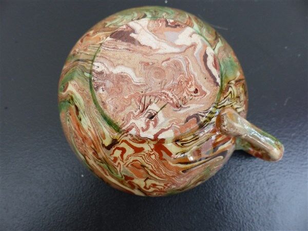 Apt earthenware coffee cup