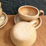 Set of 4 coffee/tea cups and saucers