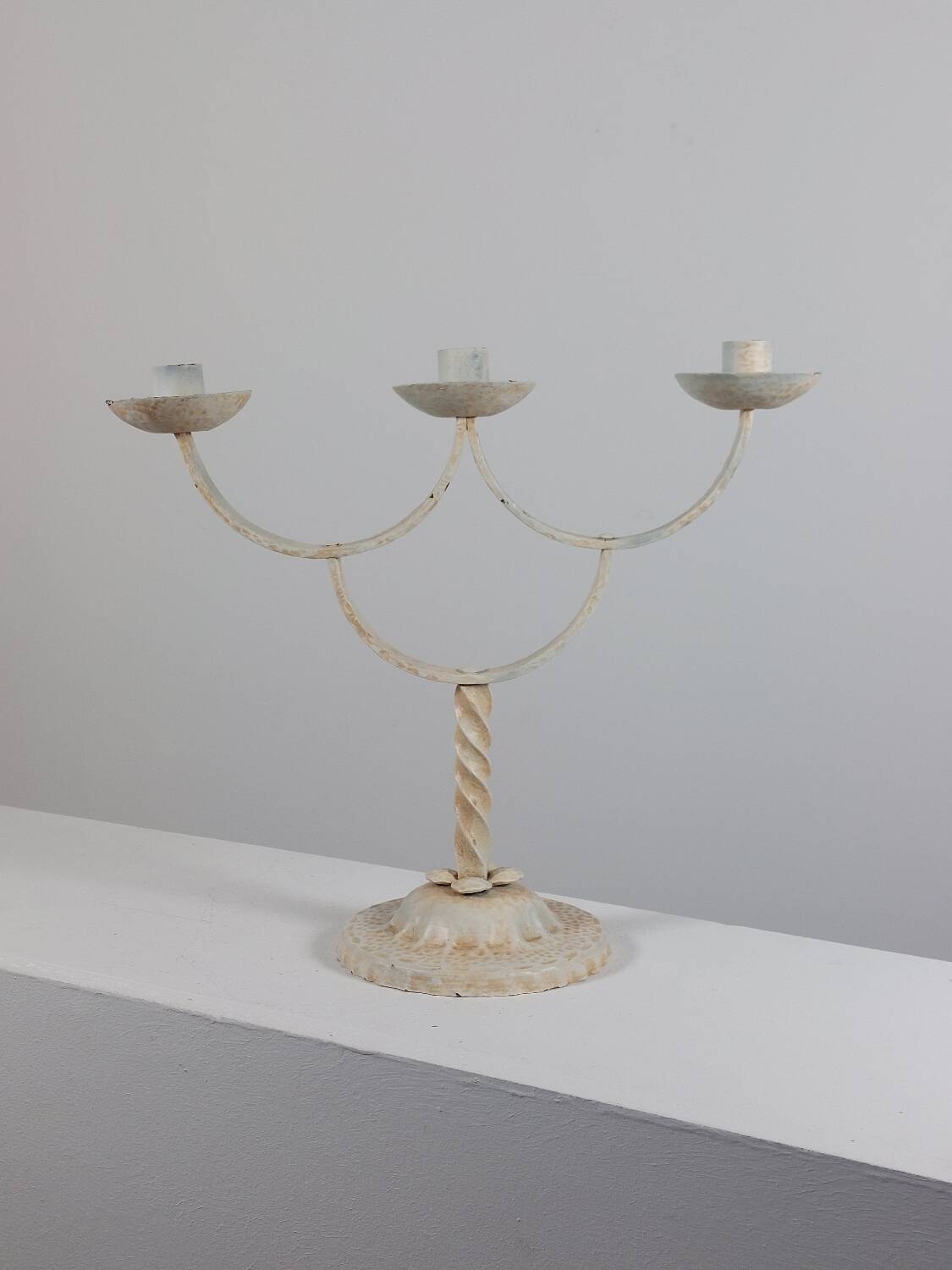 Vintage patinated lacquered metal candlestick brocante
