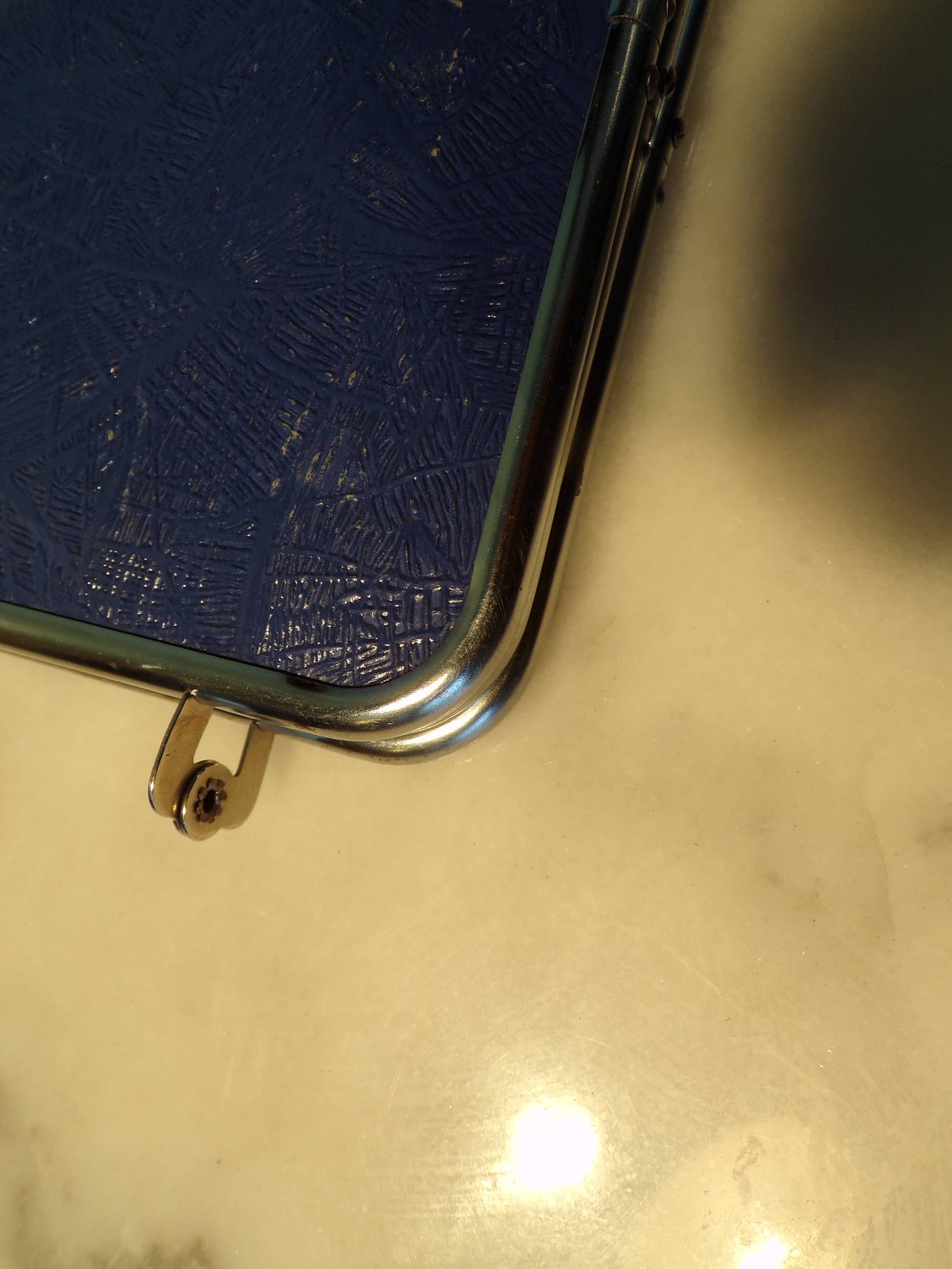 Triptych mirror with chain.