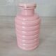 Set of pink and gold ceramic bathroom accessories