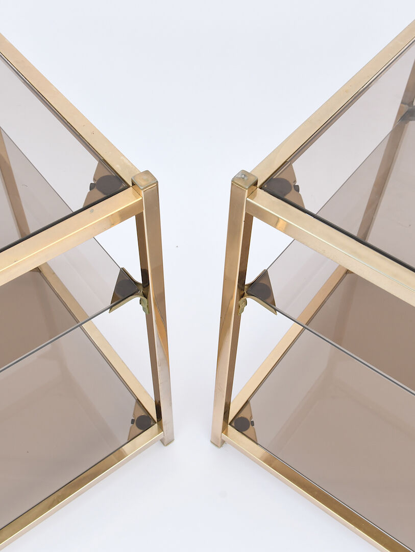 Pair of sofa tips in gilded metal and glass