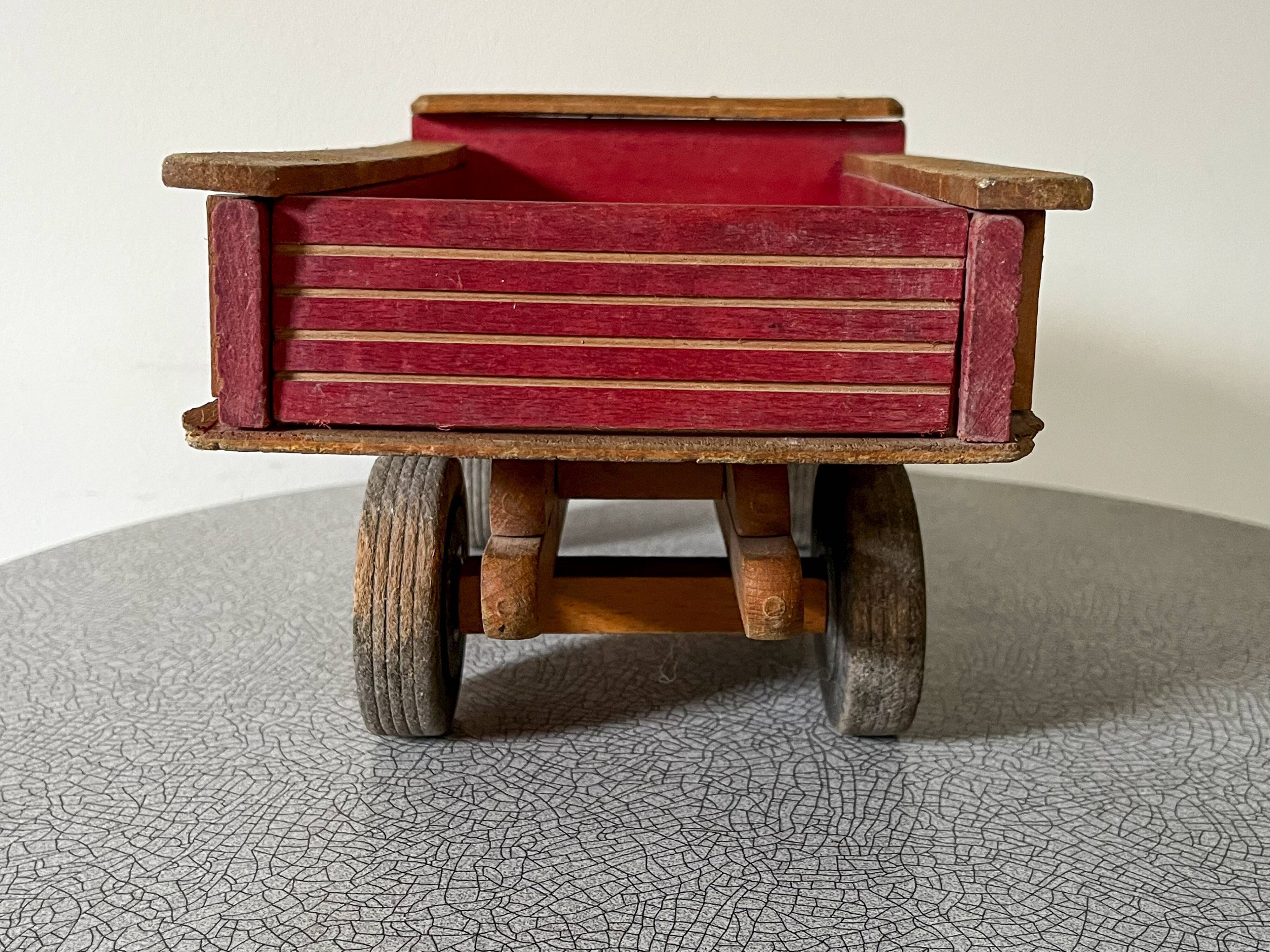 Wooden dump truck from the famous french brand dejou
