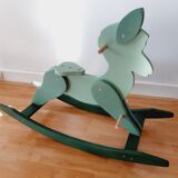 Cheval de bois à bascule