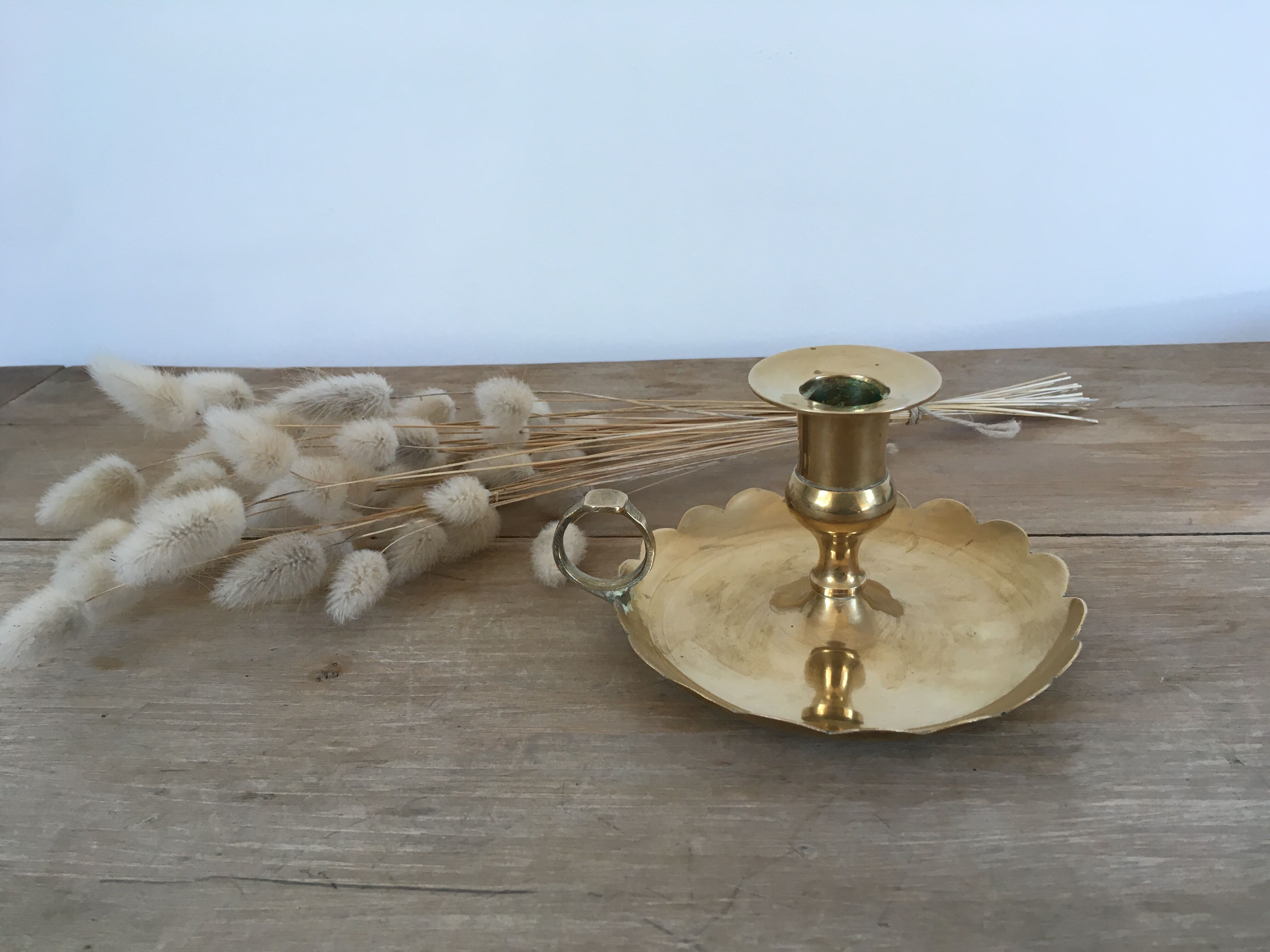 Brass cellar rat candle holder