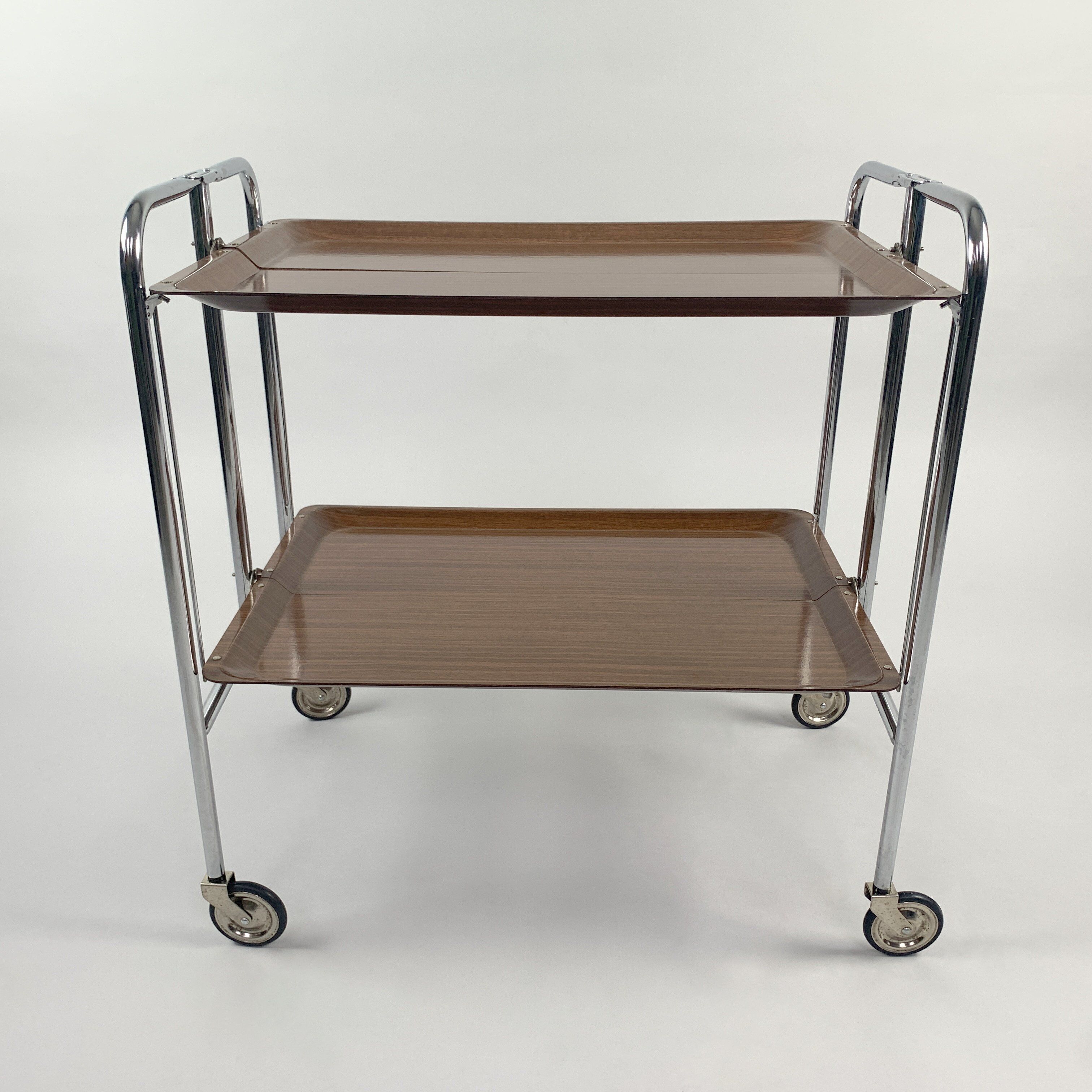 Chrome and laminated wood folding serving trolley, 1950