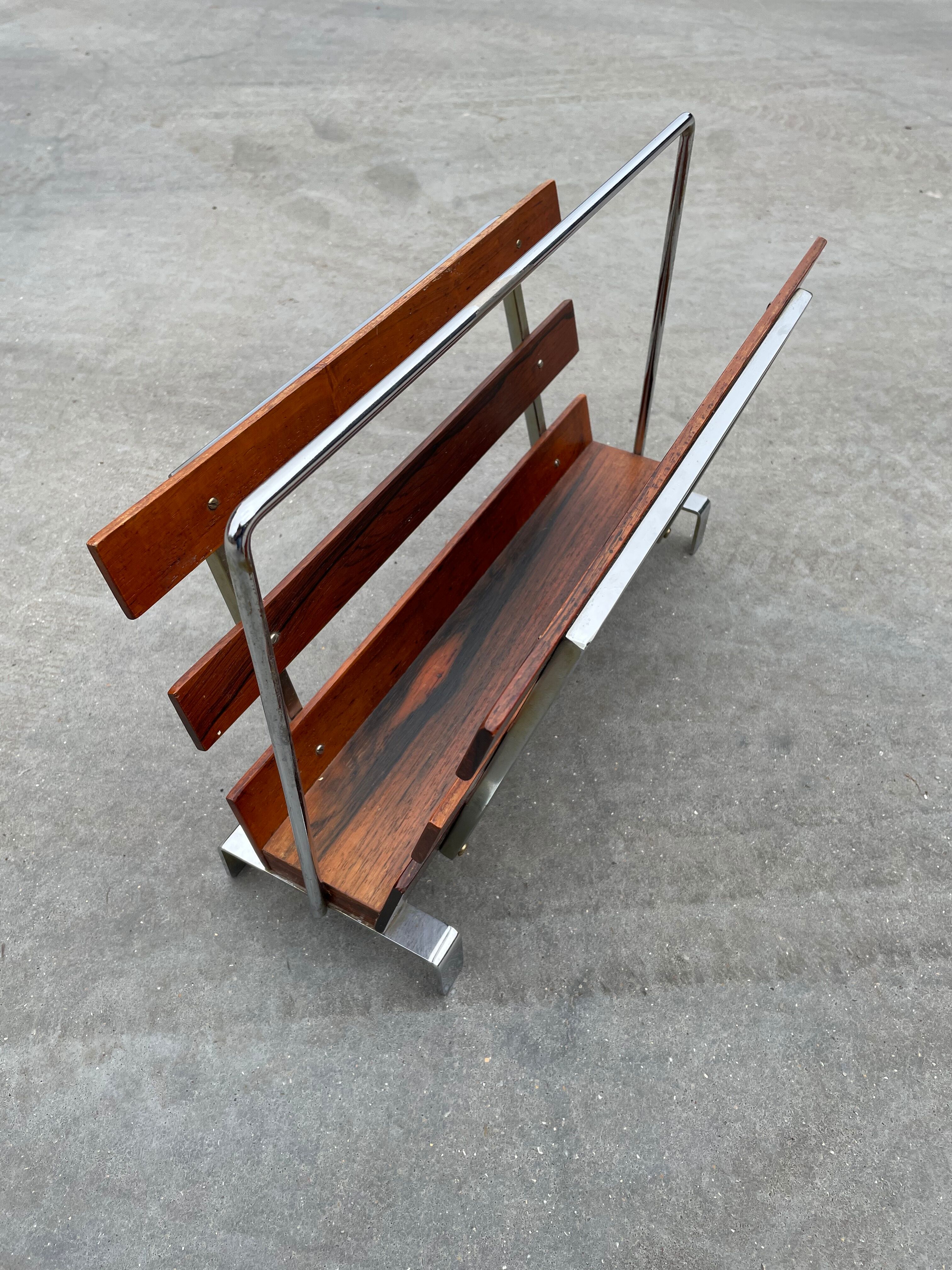 Vintage magazine rack from  rosewood and chrome design