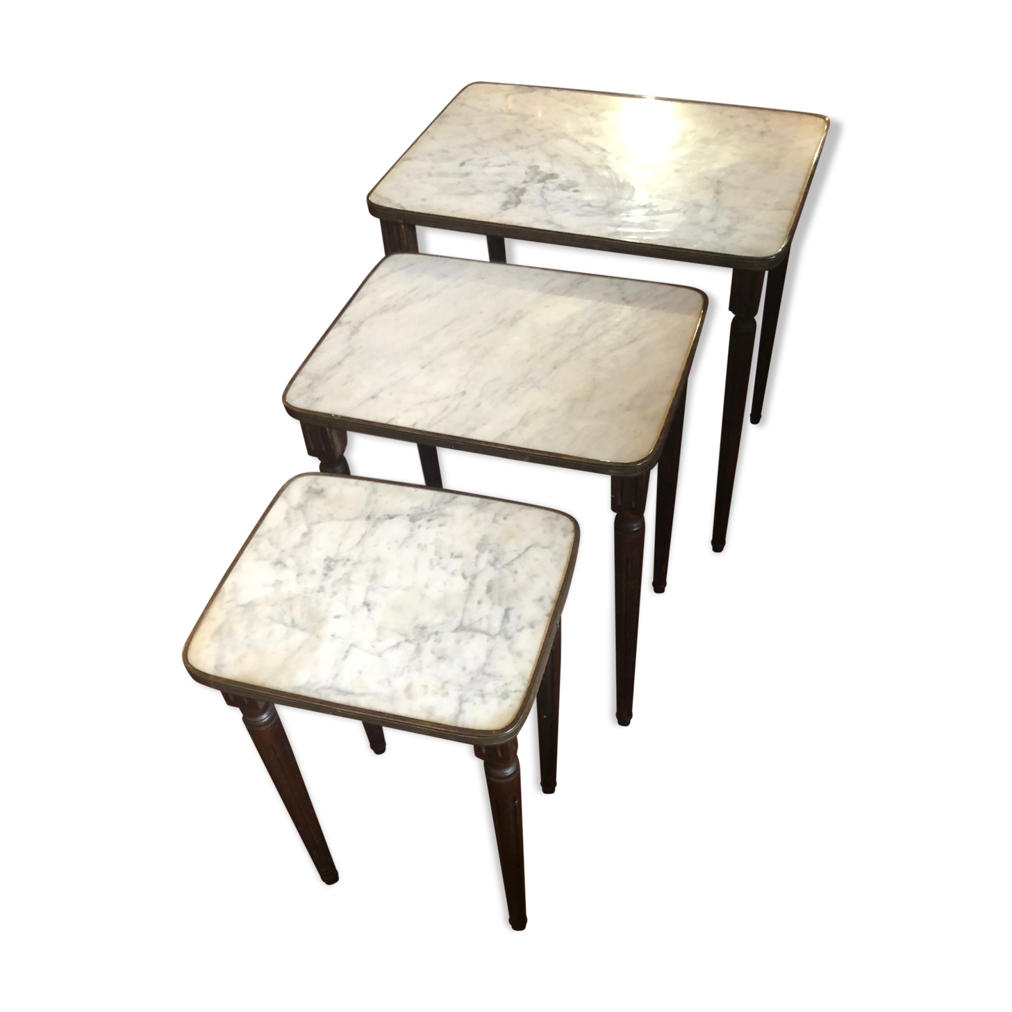 Pull-out tables in brass marble and wood