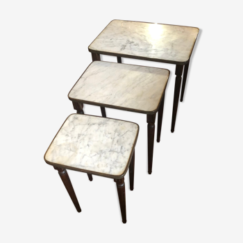Pull-out tables in brass marble and wood