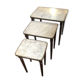 Pull-out tables in brass marble and wood