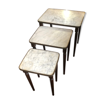 Pull-out tables in brass marble and wood