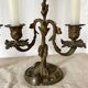 Pair of antique bronze candlesticks at the end of the table XIXth