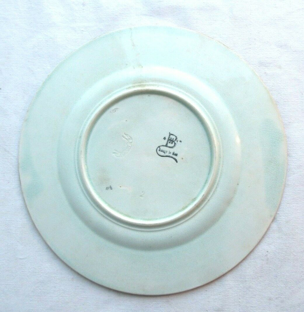 Slurry plate Choisy le Roi: Leaves and flowers bound by a ribbon