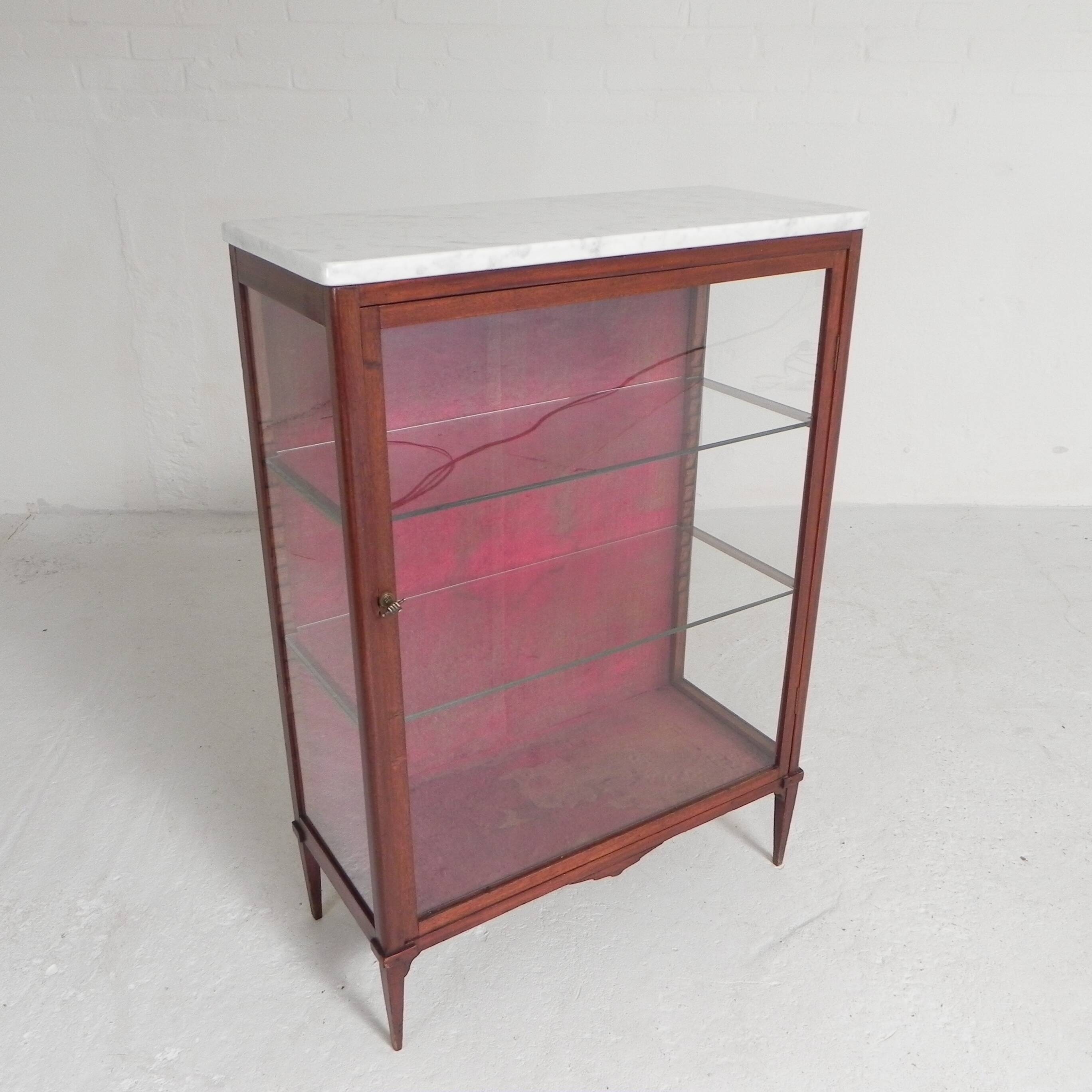 Mahogany display cabinet with marble top, 1920s