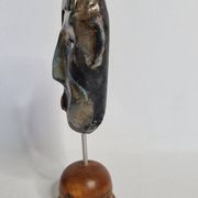 Signed raku ceramic mask on wooden base Contemporary sculpture 30 cm