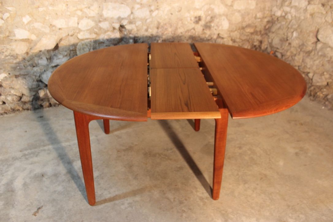 Scandinavian vintage teak dining table with 2 extension cords hidden by Svend Aage Madsen for Knudsen - Son, Denmark